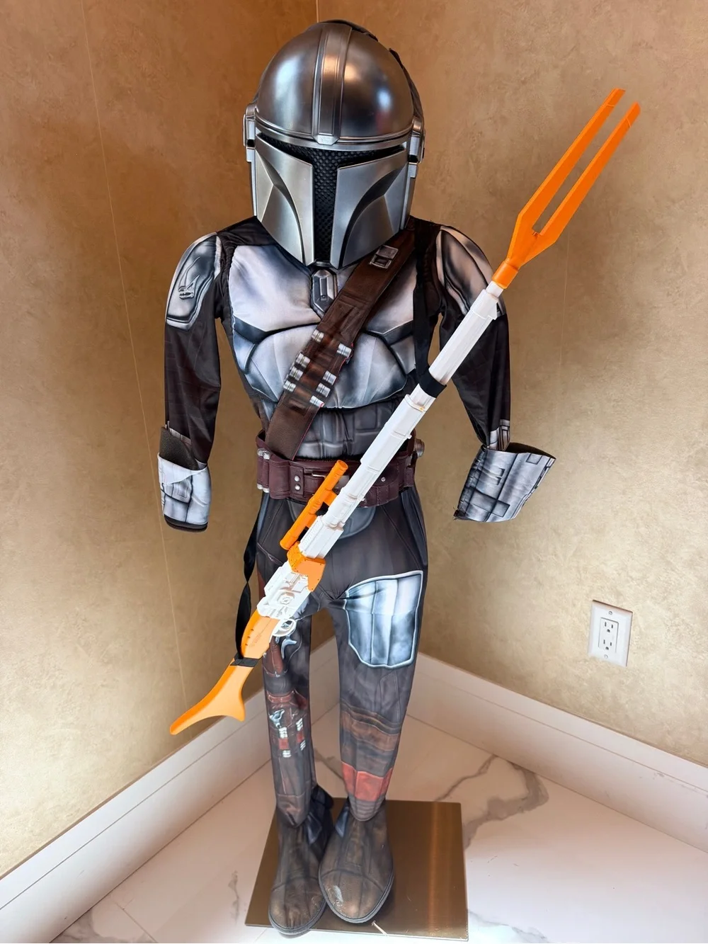 Star Wars Mandalorian Costume with Orange and White Toy Gaffi Pike